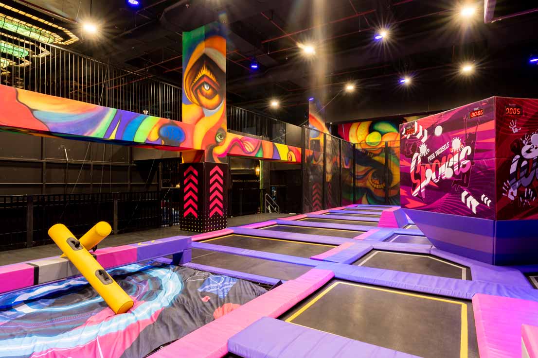 First-time visitors enjoying trampoline park at The Game Palacio