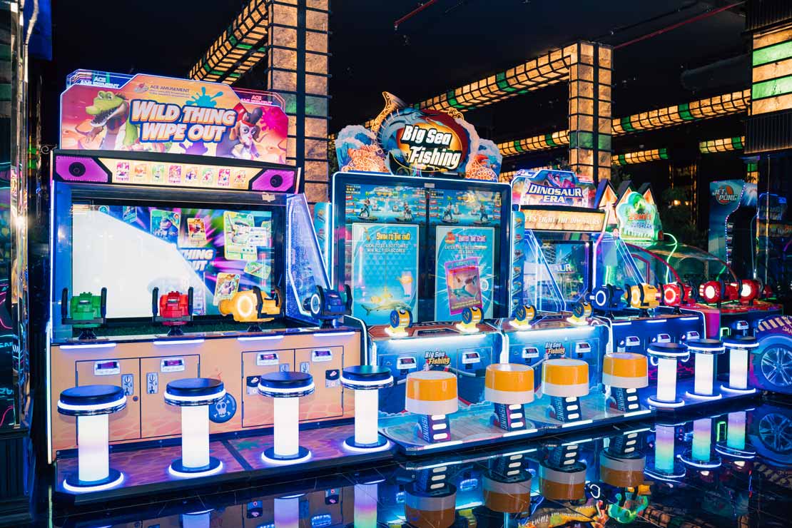 Group playing modern arcade games near me