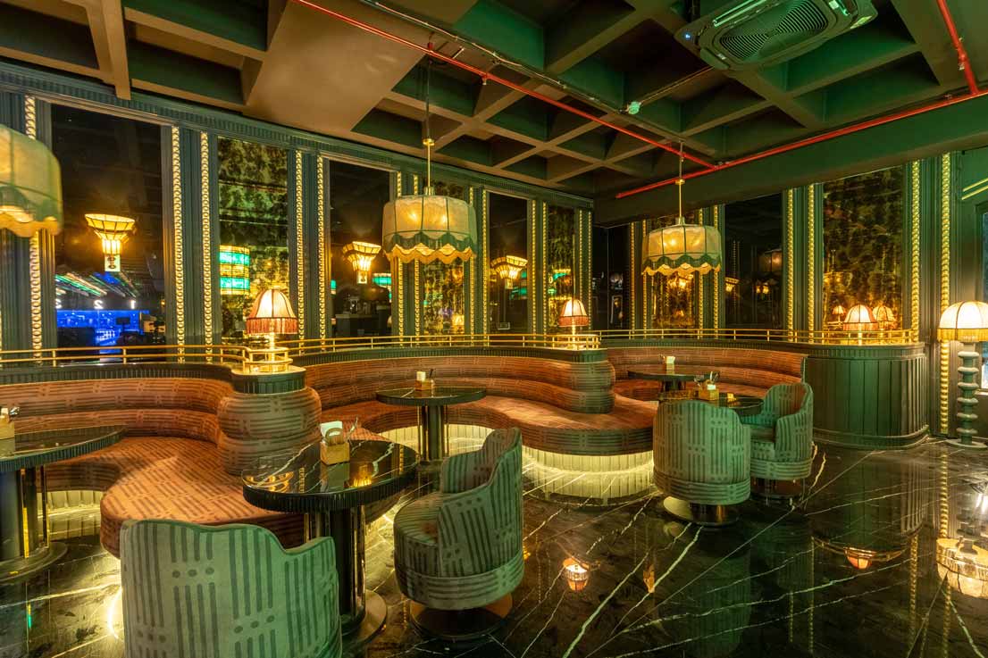 Group of college friends playing VR games and laughing at The Game Palacio indoor gaming arena in Ansal Plaza