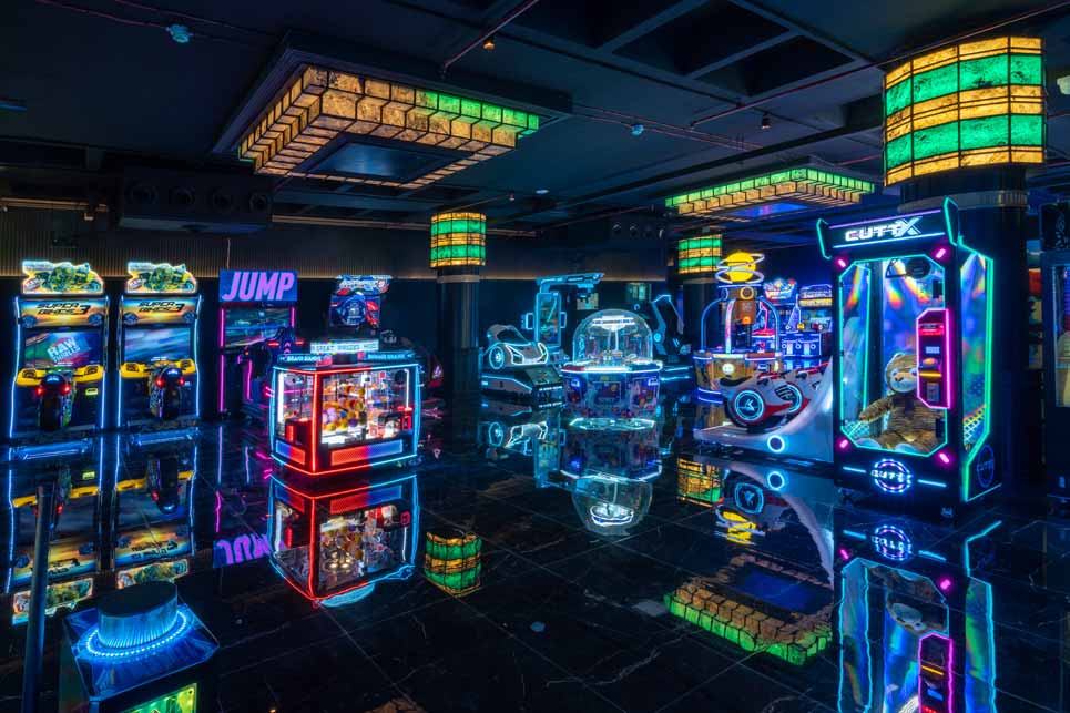 Group celebrating at The Game Palacio entertainment hub in Ansal Plaza Delhi with bowling and party decorations